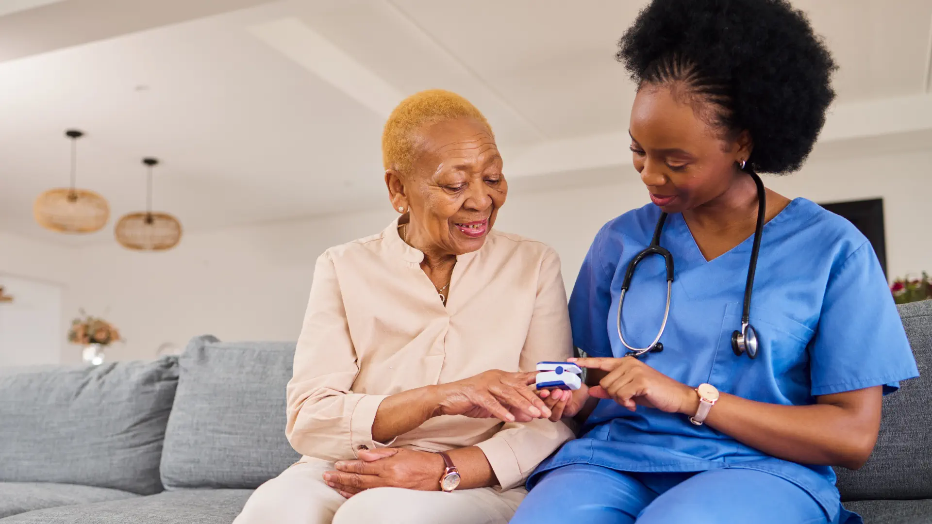 caregiver and an elderly talking