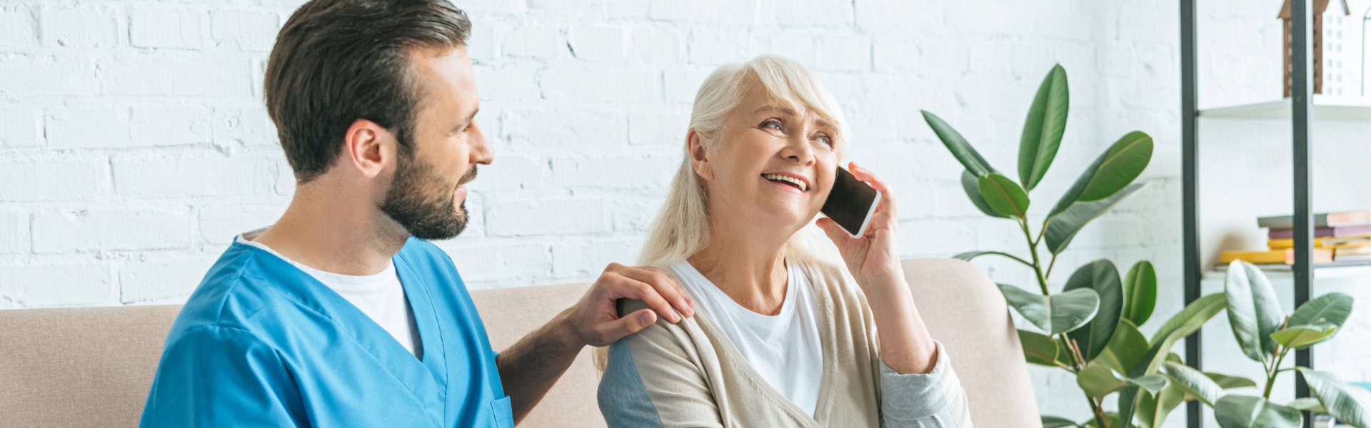 caregiver and an elderly talking